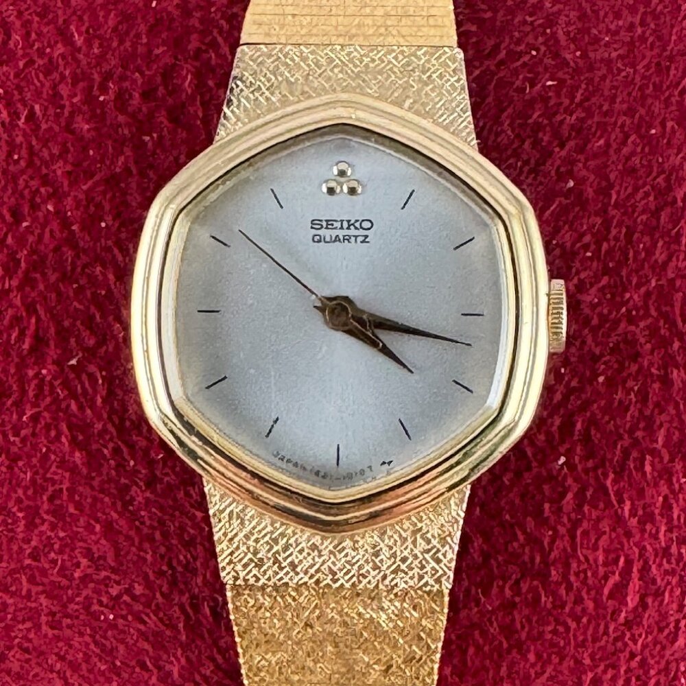 Vintage Seiko Watch with a Hexagon Shaped Bezel Silver sunburst Dial